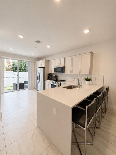 Furnished interior view inside a new home in , Pembroke Pines (Image 17).