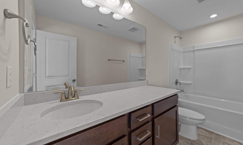 Representative furnished interior of a home built from the The Sycamore by Chesapeake Homes in Terrapin, Leland (Image 14).