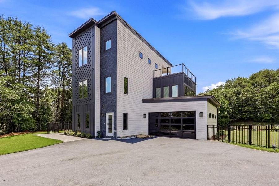 Front exterior of a new home in , Helen, GA, highlighting curb appeal (Image 23).