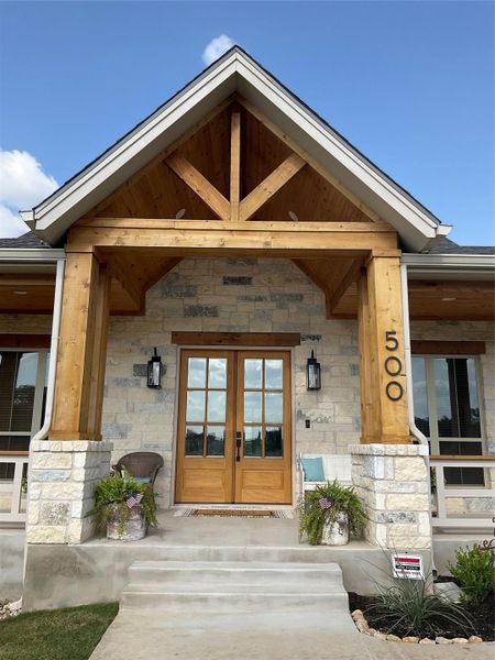 Front exterior of a new home in , Liberty Hill, TX, highlighting curb appeal (Image 1).