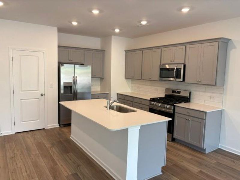 Furnished interior view inside a new home in Towns at Ivy Creek, Buford (Image 4). Furnished interior view inside a new home in Towns at Ivy Creek, Buford (Image 4).