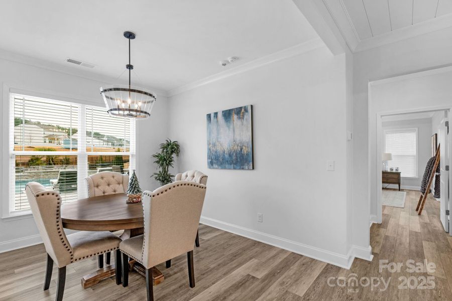 Breakfast nook with hall access to primary bedroom on the main level