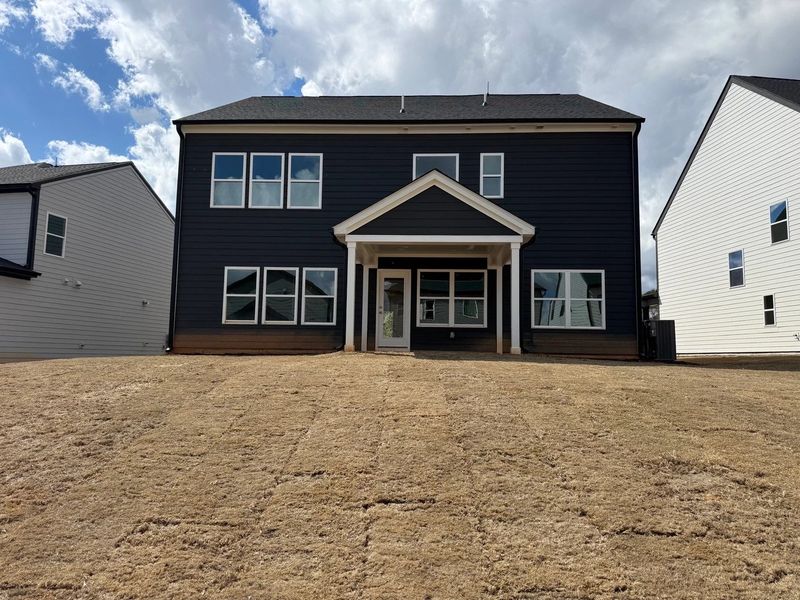 Exterior details and patio area of a home in Rowland's Grant, Fuquay Varina (Image 6).