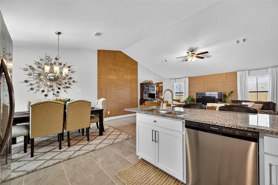 Furnished interior view inside a new home in Sunterra, Katy (Image 7).
