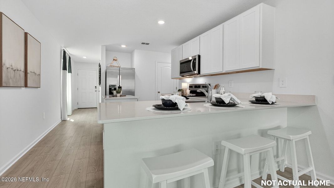 Furnished interior view inside a new home in Trout River, Jacksonville (Image 13).