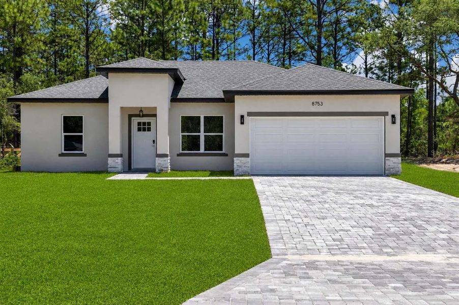 Front exterior of a new home in , Citrus Springs, FL, highlighting curb appeal (Image 2). Front exterior of a new home in , Citrus Springs, FL, highlighting curb appeal (Image 2).