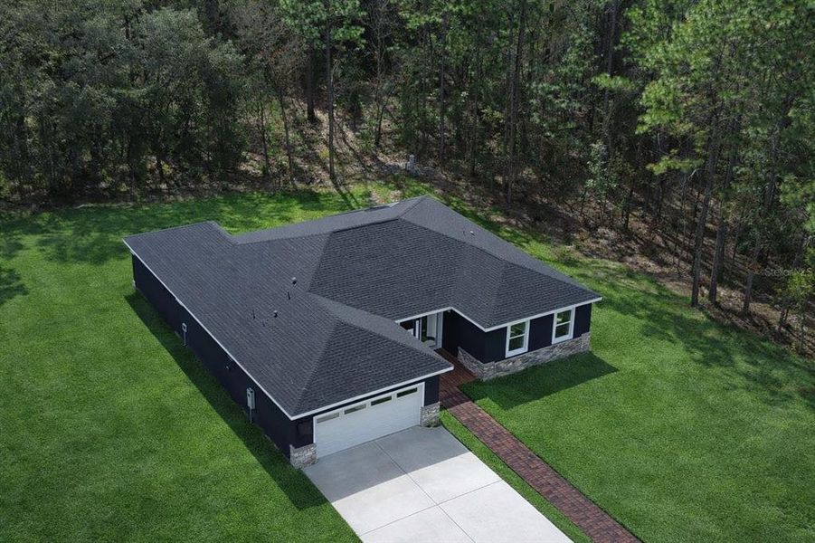 Front exterior of a new home in , Dunnellon, FL, highlighting curb appeal (Image 20).