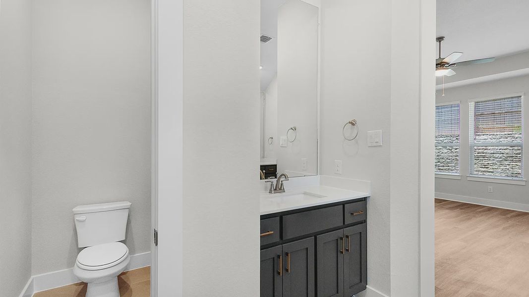 Representative furnished interior of a home built from the Brenner by Chesmar Homes in Newhaven, Manor (Image 16).