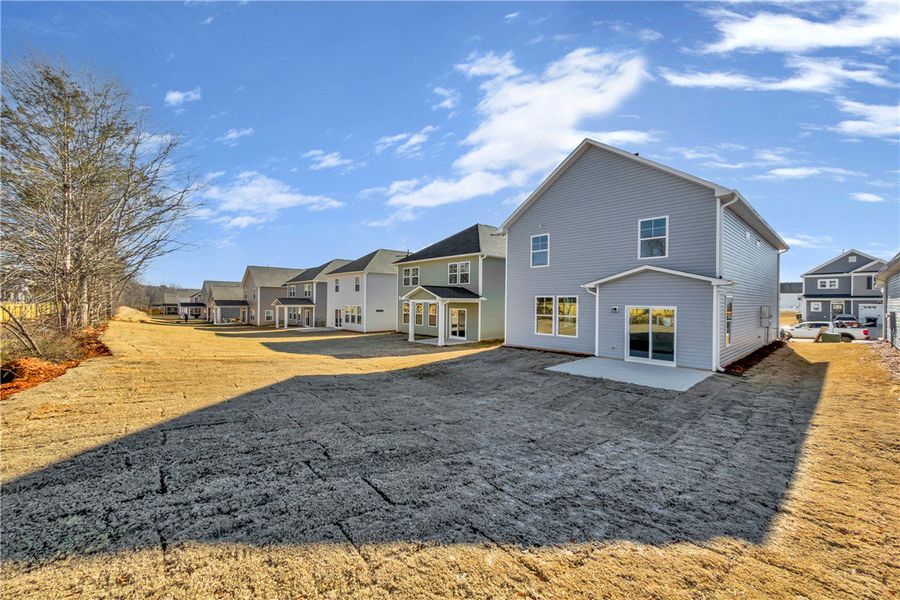 Exterior details and patio area of a home in Brownstone Park, Easley (Image 3).