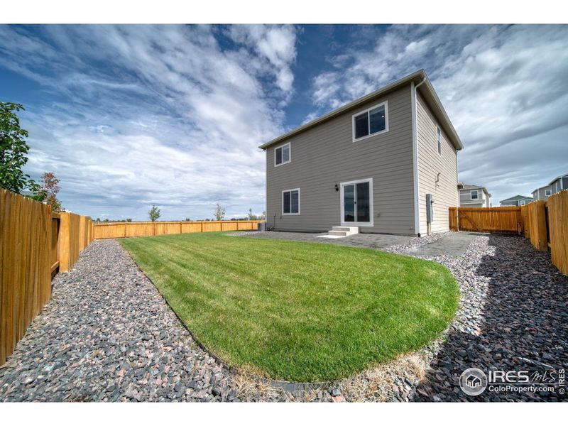 Front exterior of a new home in Hidden Creek, Frederick, CO, highlighting curb appeal (Image 2).