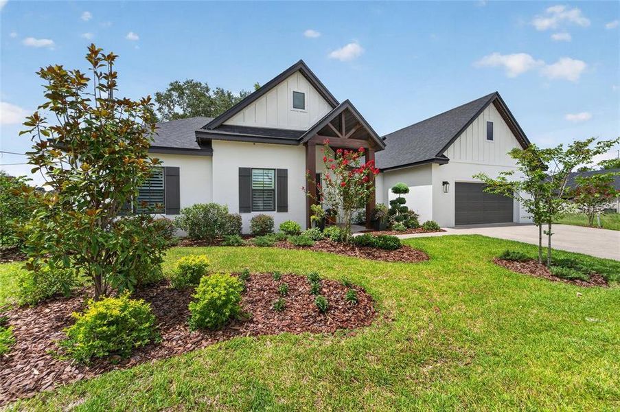 Front exterior of a new home in , Lakeland, FL, highlighting curb appeal (Image 31). Front exterior of a new home in , Lakeland, FL, highlighting curb appeal (Image 31).