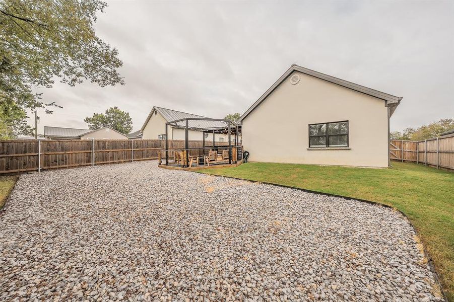 Fenced backyard with a patio Fenced backyard with a patio