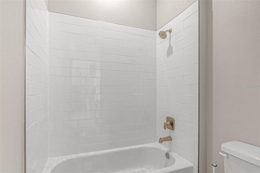 Furnished interior view inside a new home in Gray Hawk at Hole Two, Daytona Beach (Image 10).