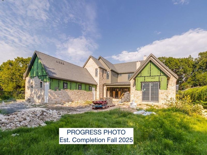 Progress Photo, Rear view of .4+ acre lot with room for pool. Estimated Completion Fall 2025.