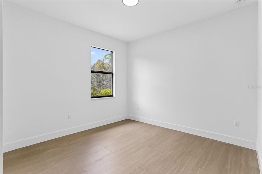 Spacious, unfurnished interior of a new home in , Port Charlotte (Image 41).