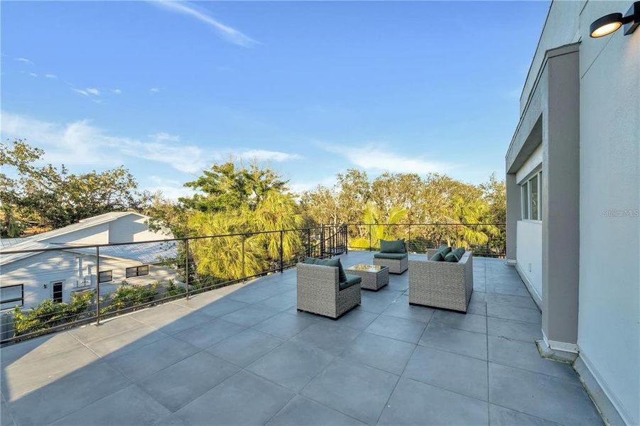 Exterior details and patio area of a home in , Sarasota (Image 3).