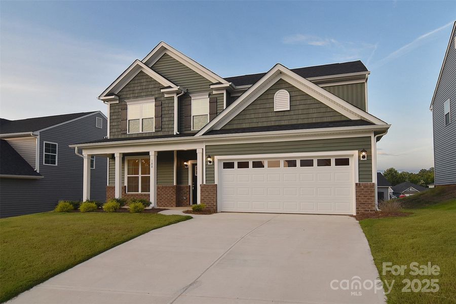 Front exterior of a new home in Larkin, Statesville, NC, highlighting curb appeal (Image 1).