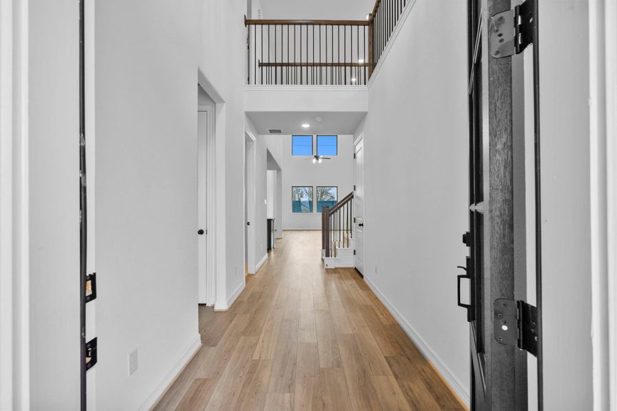 An inviting entryway leads you effortlessly into an open-concept living space designed for everyday comfort.