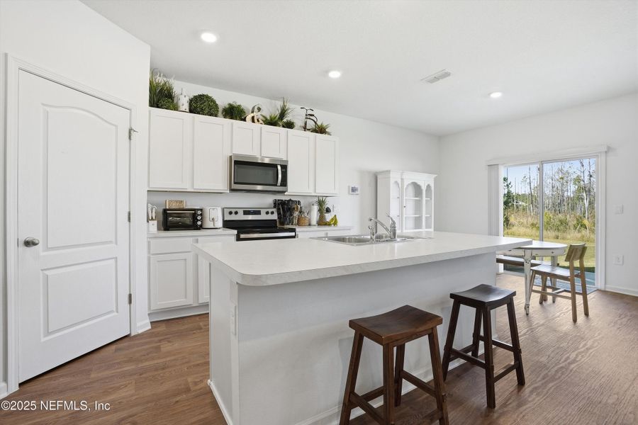 Furnished interior view inside a new home in Cross Creek Express, Green Cove Springs (Image 27).
