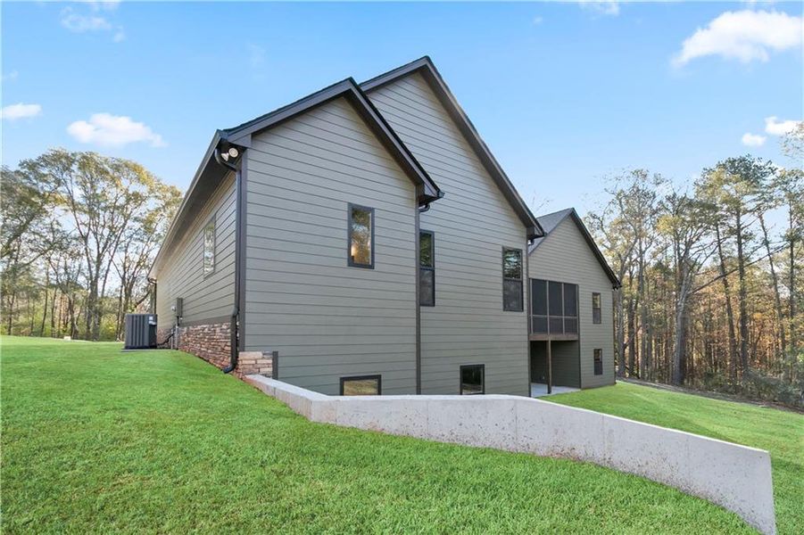 Front exterior of a new home in , Carrollton, GA, highlighting curb appeal (Image 28).