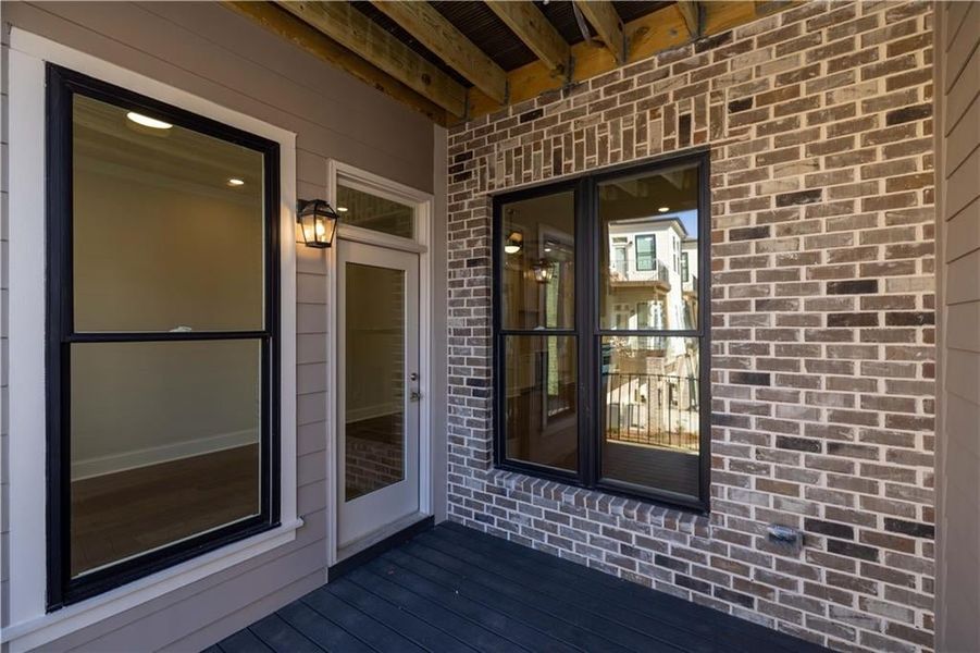 View of exterior entry from back deck- Image is of previously built Chamberlain