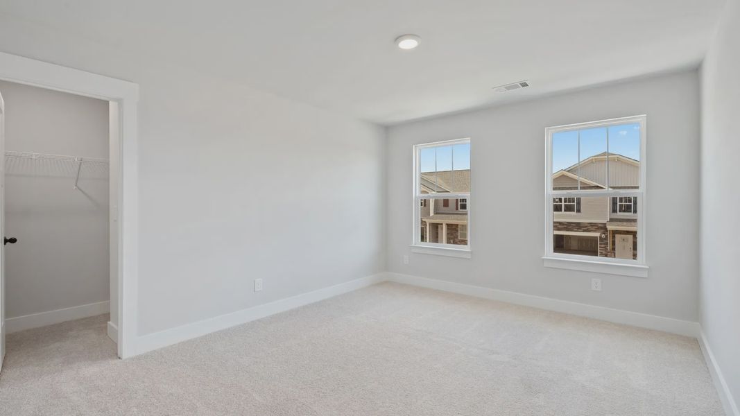 Representative furnished interior of a home built from the Stonefield - Finished Basement by DRB Homes in Pinebrook, Woodruff (Image 31).