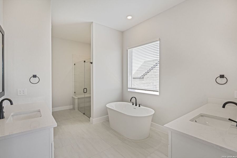 Furnished interior view inside a new home in Potranco West, Castroville (Image 10).