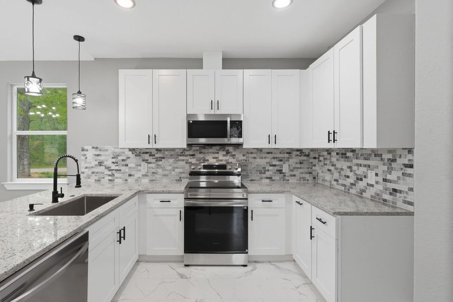 Furnished interior view inside a new home in , Willis (Image 8).