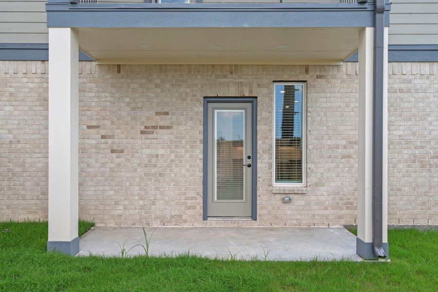 Exterior details and patio area of a home in Meridiana Courtyard Collection, Iowa Colony (Image 20). Exterior details and patio area of a home in Meridiana Courtyard Collection, Iowa Colony (Image 20).