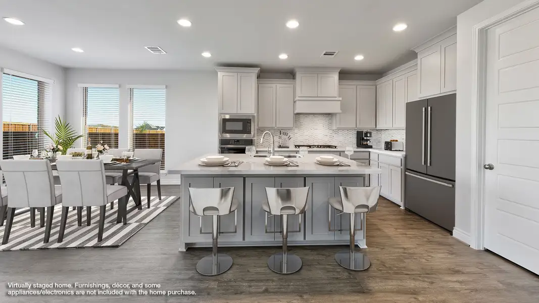 Furnished interior view inside a new home in Crosswinds, Kyle (Image 3).