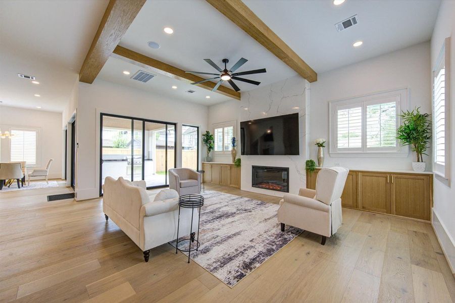 Coffered ceiling with decorative beams matching the White Oak cabinetry and floors.