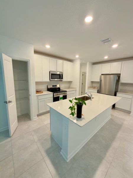 Furnished interior view inside a new home in , Kissimmee (Image 11). Furnished interior view inside a new home in , Kissimmee (Image 11).