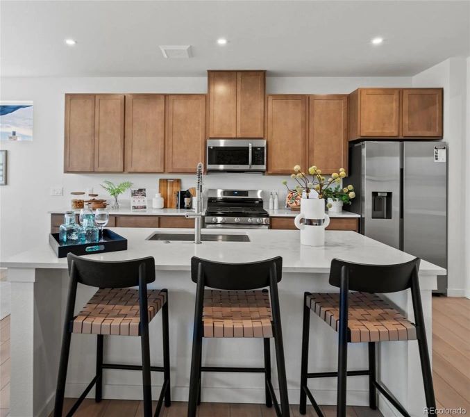 Furnished interior view inside a new home in The Commons at Victory Ridge, Colorado Springs (Image 3).