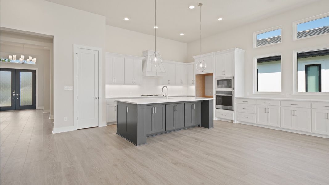 Furnished interior view inside a new home in Glynlea Country Club, Port St. Lucie (Image 5).