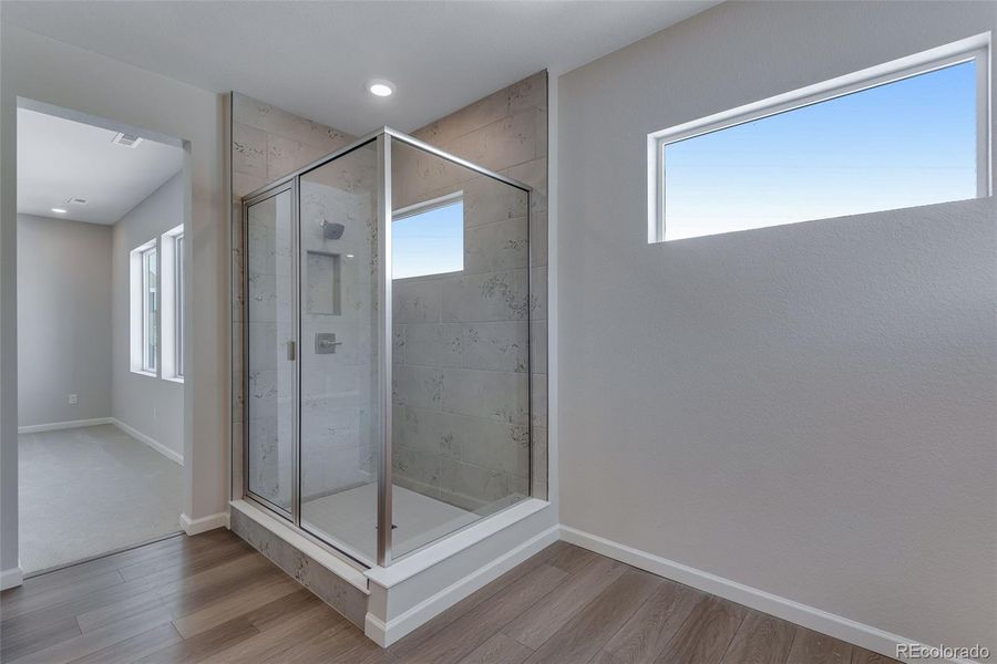 Spacious, unfurnished interior of a new home in Medley at Reunion Ridge, Commerce City (Image 35).