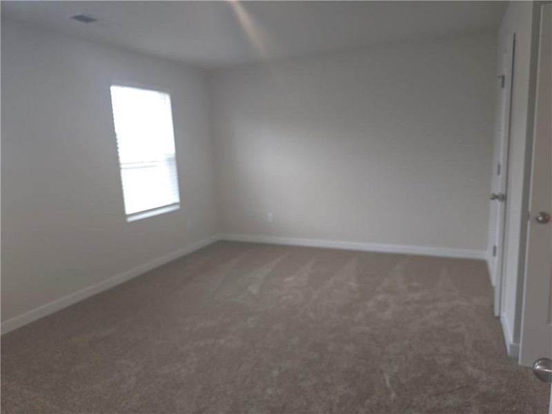Spacious, unfurnished interior of a new home in Southern Hills, McDonough (Image 27).