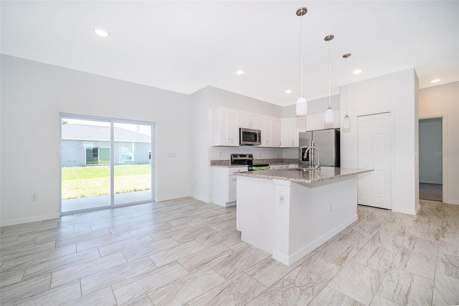 Furnished interior view inside a new home in , Kissimmee (Image 6).