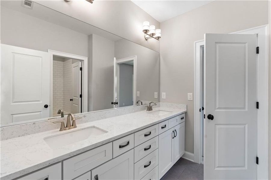 Furnished interior view inside a new home in Bellwyn, Johns Creek (Image 12).