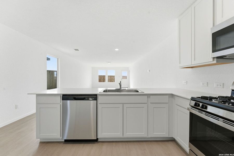 Furnished interior view inside a new home in , New Braunfels (Image 7).