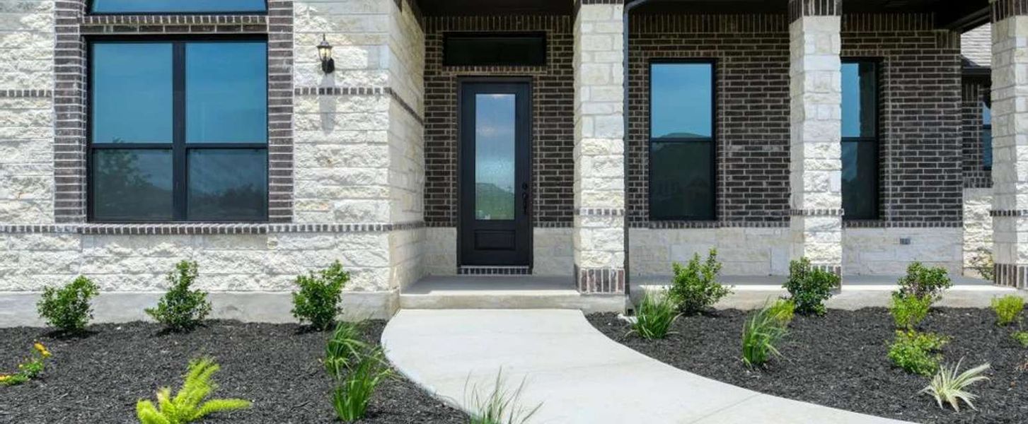 Representative exterior photo of a completed home built from the Cayden by Ashton Woods in Waldsanger, New Braunfels, TX (Image 2). Representative exterior photo of a completed home built from the Cayden by Ashton Woods in Waldsanger, New Braunfels, TX (Image 2).