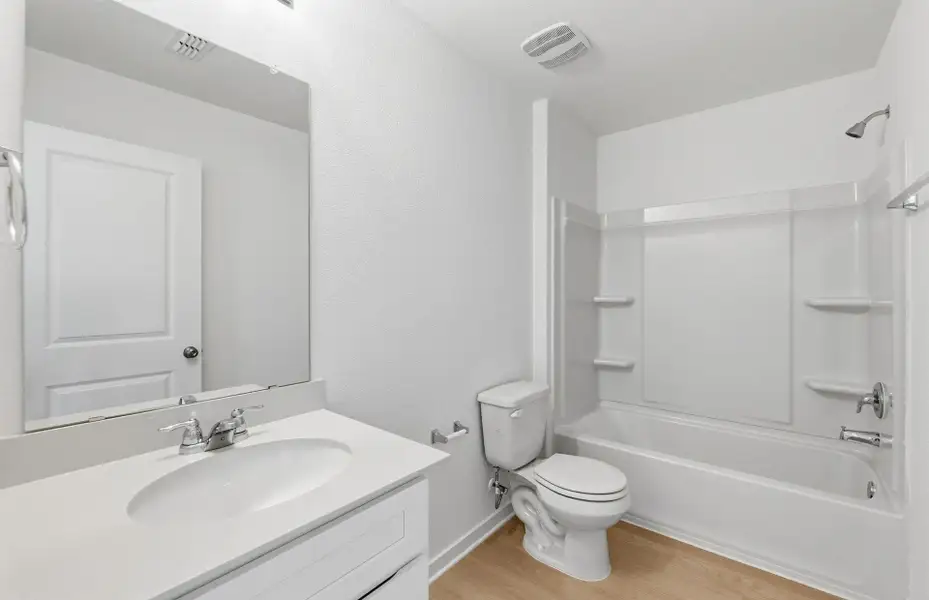 Furnished interior view inside a new home in Cameron Place, Manor (Image 6).