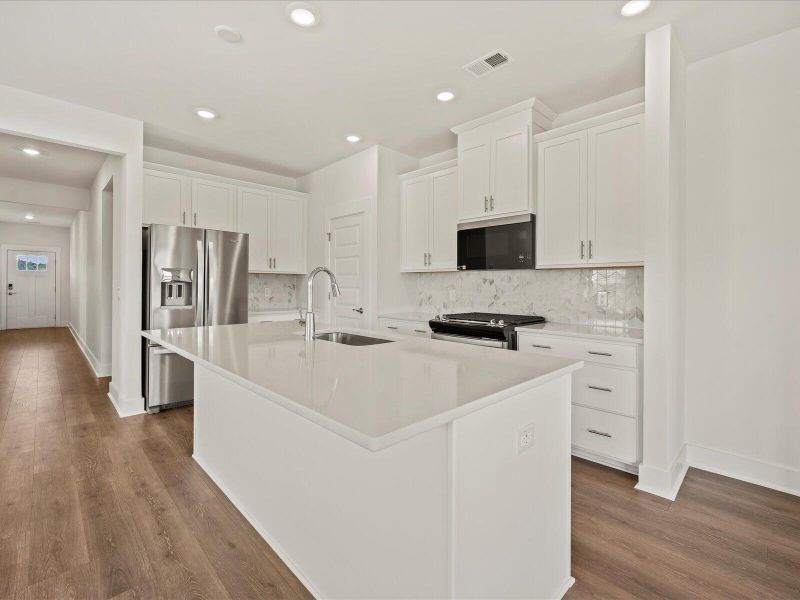 Furnished interior view inside a new home in The Coves at Lakes of Cane Bay, Summerville (Image 6). Furnished interior view inside a new home in The Coves at Lakes of Cane Bay, Summerville (Image 6).