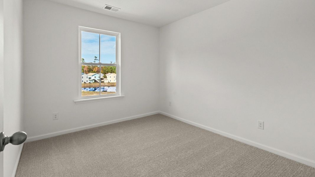 Furnished interior view inside a new home in Seabreeze Crossing, Little River (Image 17).