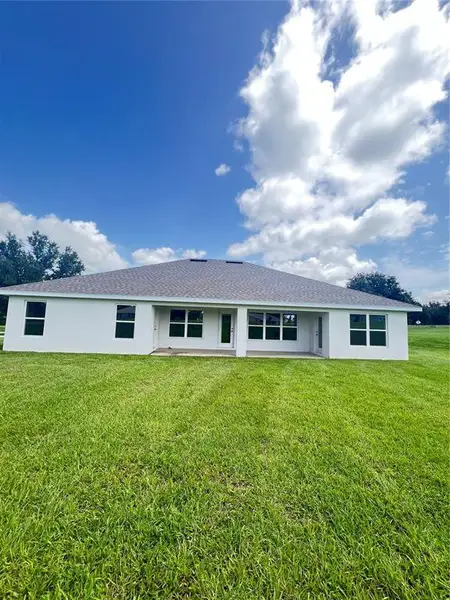 Exterior details and patio area of a home in Hill Country Estates, Dade City (Image 16). Exterior details and patio area of a home in Hill Country Estates, Dade City (Image 16).