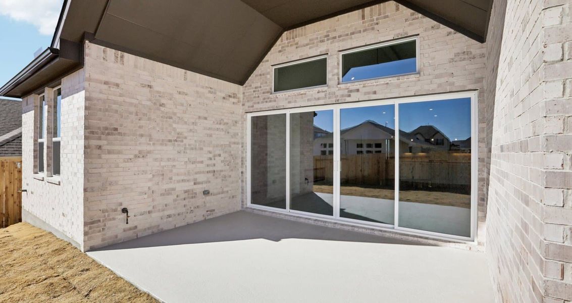 Exterior details and patio area of a home in Sunfield, Buda (Image 4).