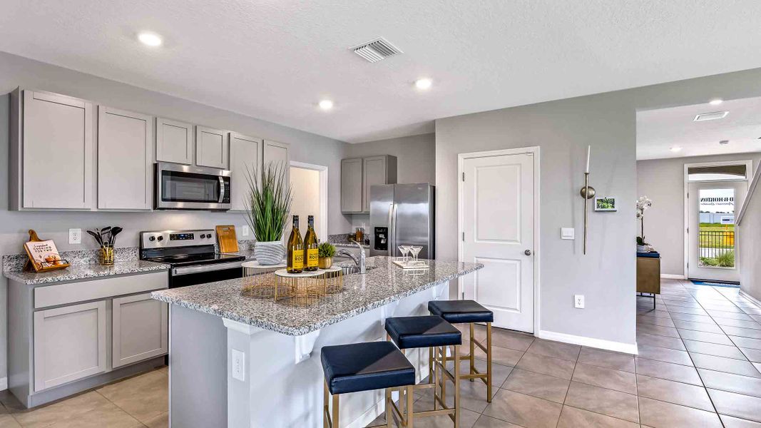 Representative furnished interior of a home built from the Robie II by D.R. Horton in Star Farms at Lakewood Ranch, Bradenton (Image 6).