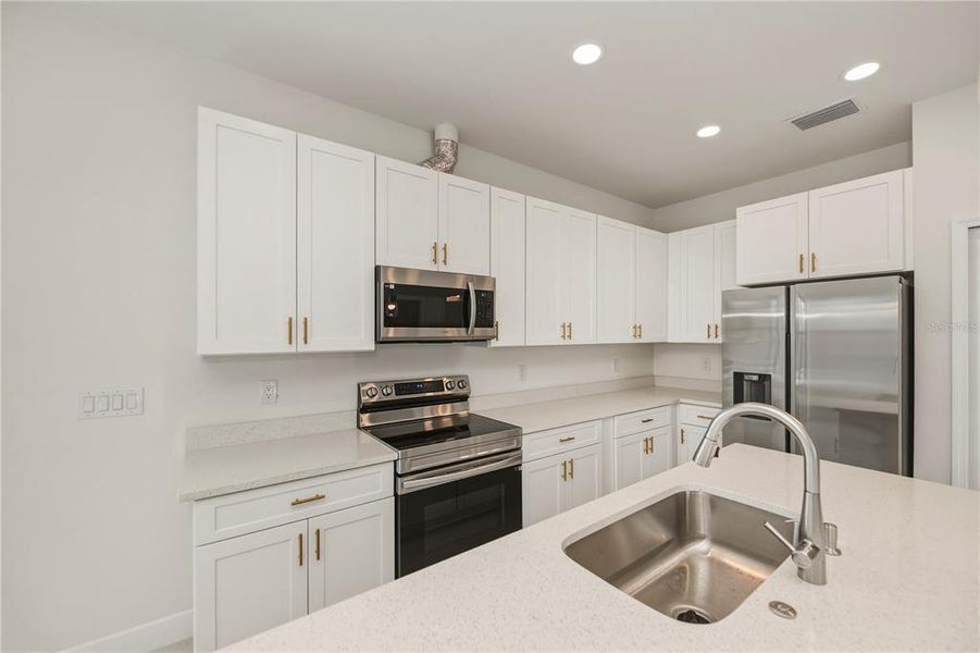 Furnished interior view inside a new home in , Port Charlotte (Image 34).