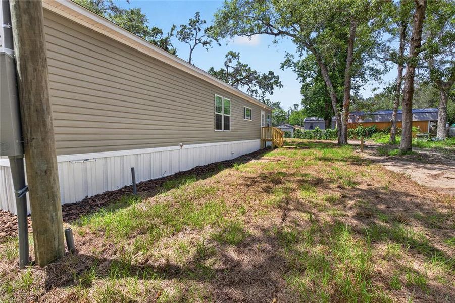 Exterior details and patio area of a home in , Brooksville (Image 30).