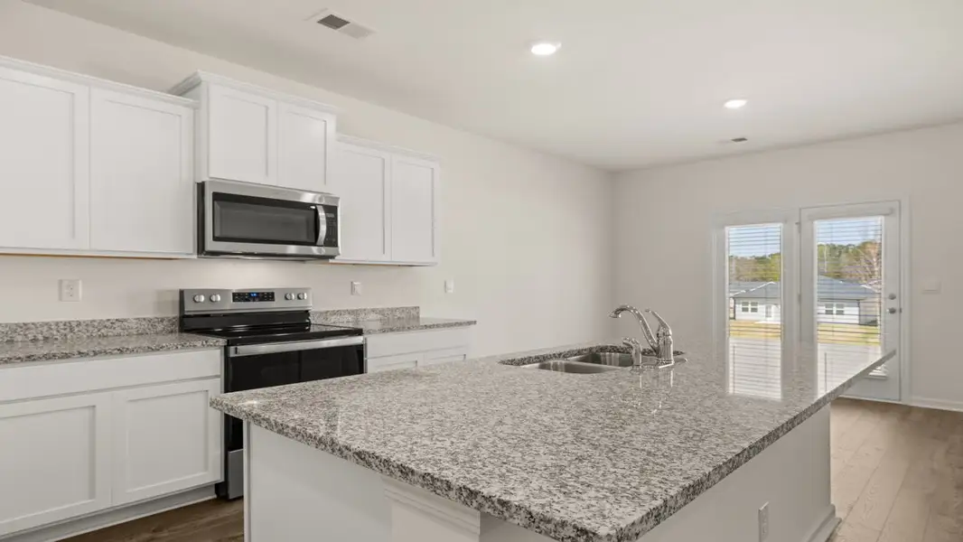 Furnished interior view inside a new home in Champion's Run, Lithonia (Image 3).