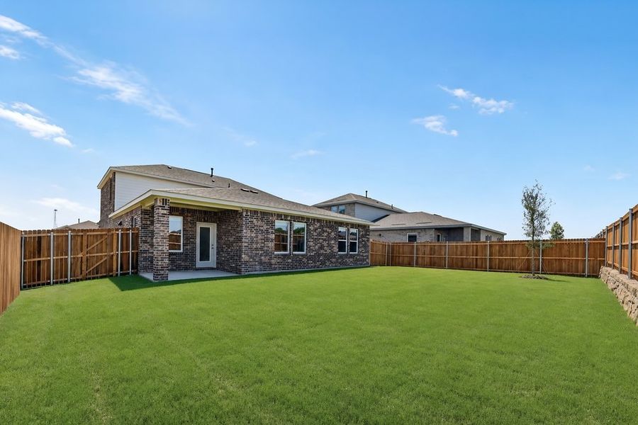 Exterior details and patio area of a home in Parks at Foster Crossing, Anna (Image 4).